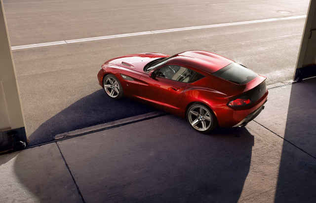 Red sports car parked roadside free wallpaper - medium preview image