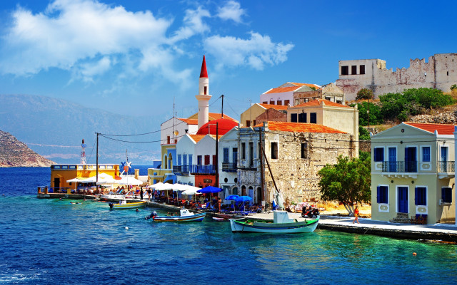 Boats shore cityscape mountains sky free wallpaper - medium preview image