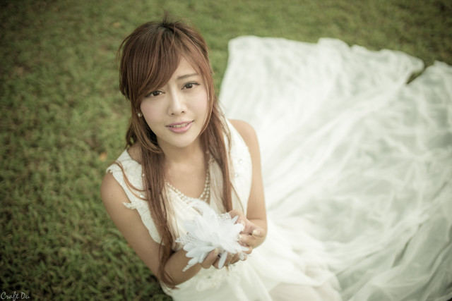 Woman white dress grass feather free wallpaper - medium preview image