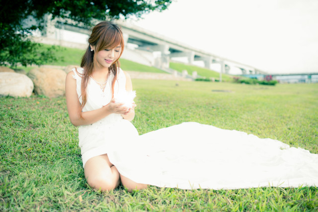 Woman white dress grass cell free wallpaper - medium preview image