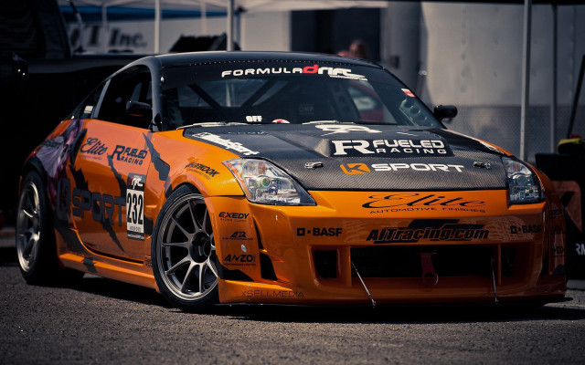Racing car sparks road building free wallpaper - medium preview image