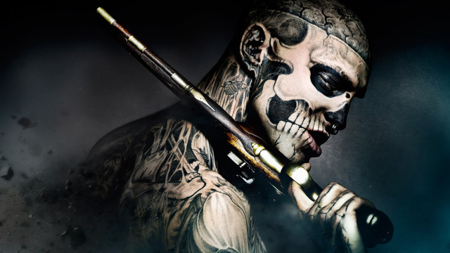Skull face paint man holding free wallpaper - medium preview image