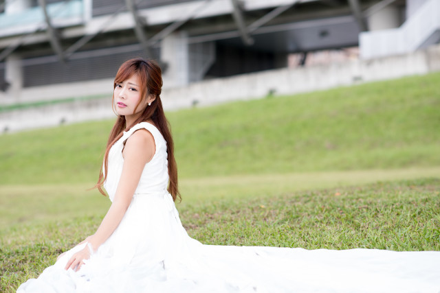 Woman white dress grass field free wallpaper - medium preview image