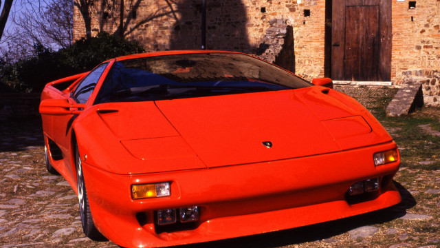 Red sports car brick building #3 free wallpaper - medium preview image