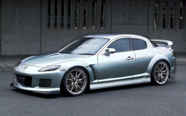 Silver sports car building parking free wallpaper - medium preview image