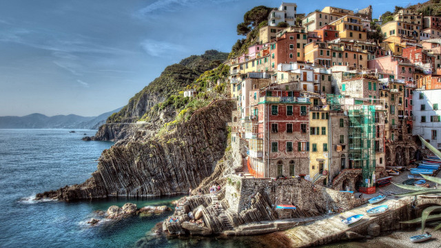 Cliffside cityscape ocean view matte free wallpaper - medium preview image
