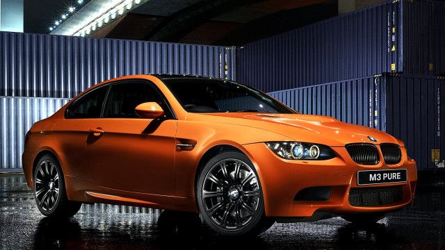Bright orange car blue garage free wallpaper - medium preview image