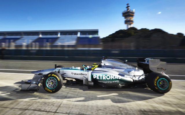 Racing car tall building tower free wallpaper - medium preview image