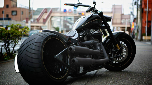 Motorcycle urban street blurry tiltshift free wallpaper - medium preview image