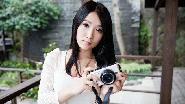 Woman camera bridge park bokeh free wallpaper - medium preview image