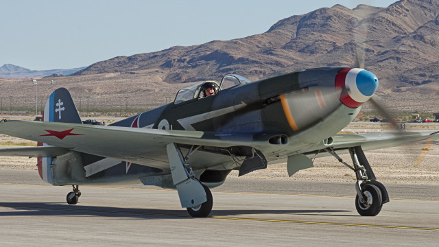 Small airplane propeller runway mountains free wallpaper - medium preview image