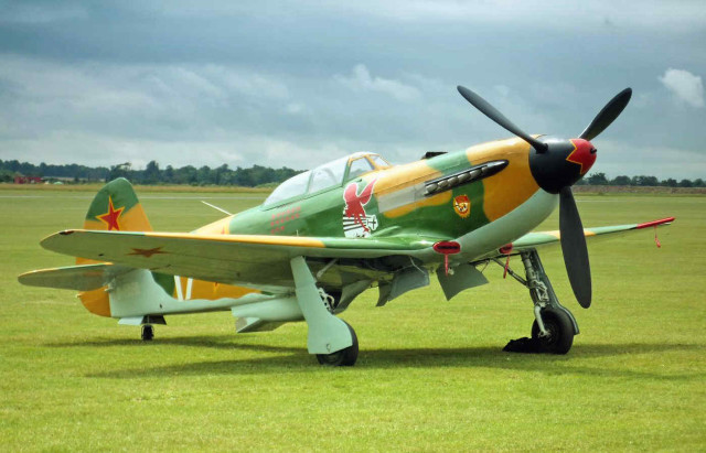 Small green yellow airplane grass free wallpaper - medium preview image
