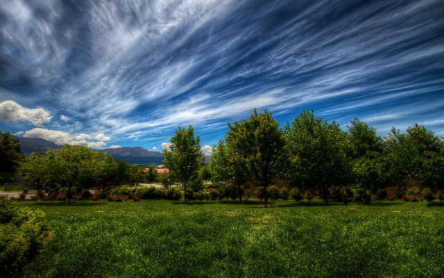 Field trees sky house mountains free wallpaper - medium preview image