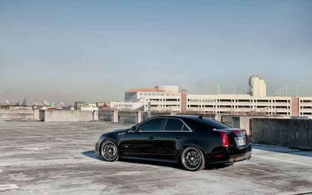 Black car parking lot city free wallpaper - medium preview image