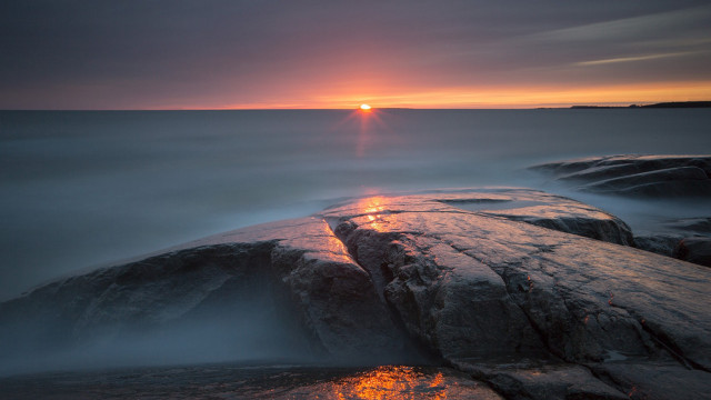 Sunset rocky beach lighthouse water #2 free wallpaper - medium preview image