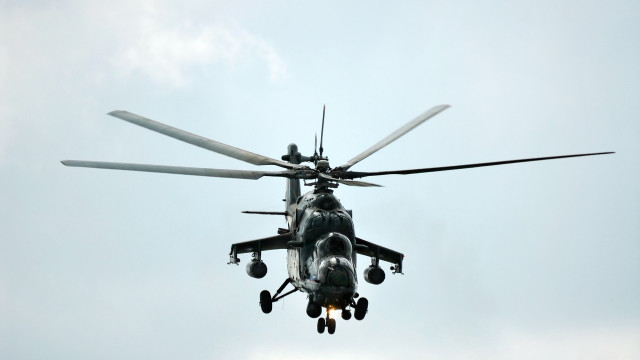 Military helicopter cloudy sky propellers free wallpaper - medium preview image