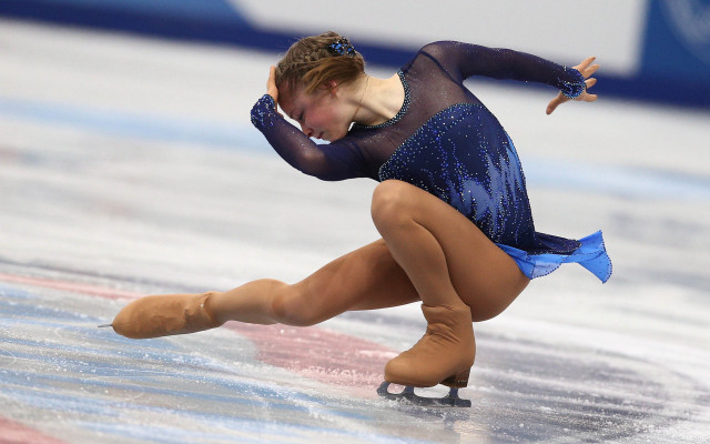 Blonde woman blue dress skating free wallpaper - medium preview image
