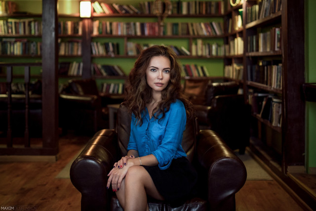 Woman sitting chair library bookcase free wallpaper - medium preview image