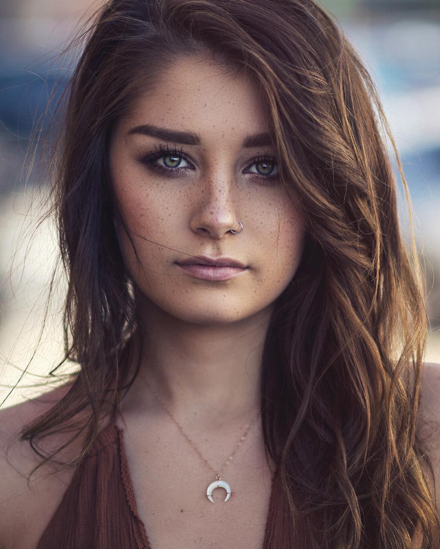Woman freckles necklace serious look free wallpaper - medium preview image