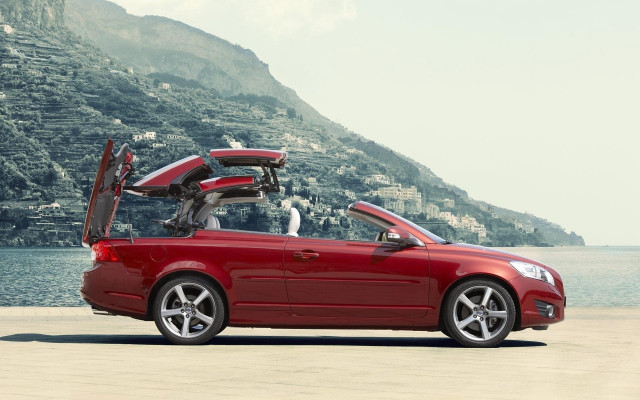 Red car beach mountain water free wallpaper - medium preview image