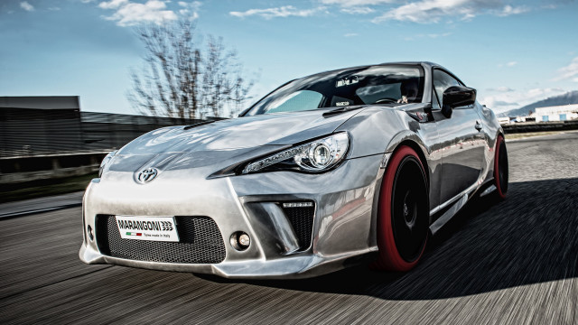 Silver sports car driving road free wallpaper - medium preview image