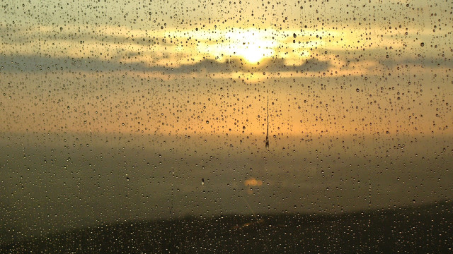 Sunset rainy window cellphone tower free wallpaper - medium preview image