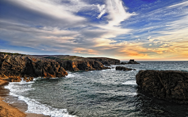 Rocky shore sunset waves cloudy free wallpaper - medium preview image