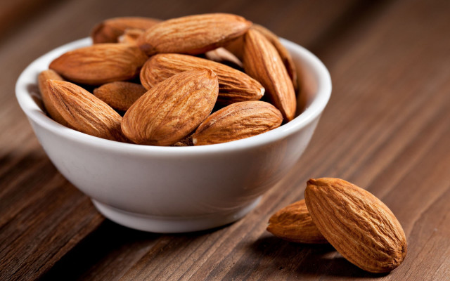 Almonds bowl wooden table spoon free wallpaper - medium preview image