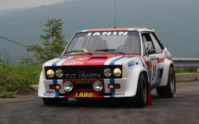 Rally car mountains road person free wallpaper - medium preview image