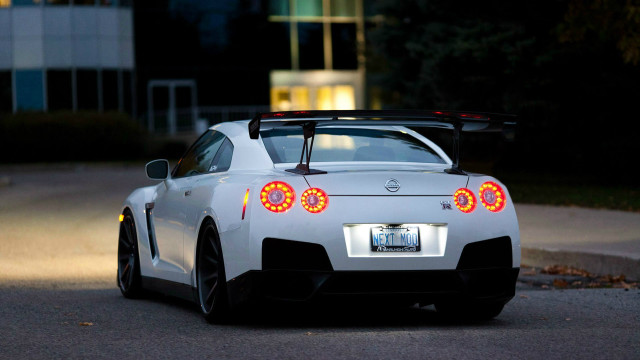 White sports car red lights free wallpaper - medium preview image