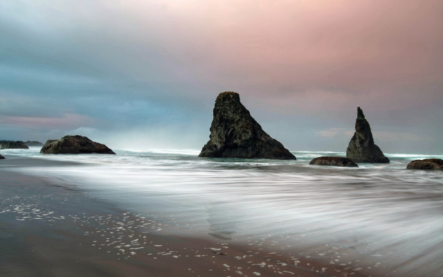 Beach rock formation sunset mountains free wallpaper - medium preview image