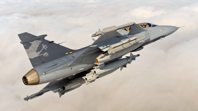 Fighter jet lion clouds daytime free wallpaper - medium preview image