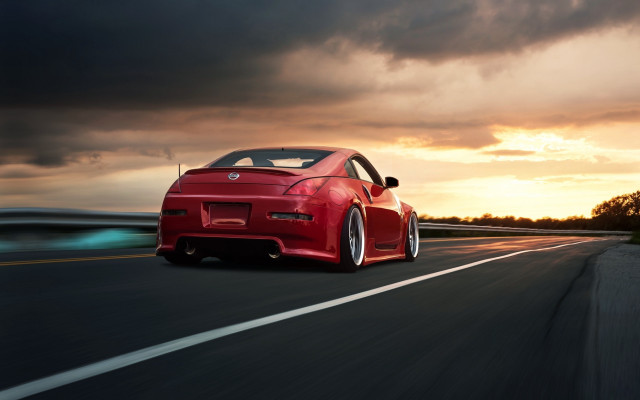Red sports car driving sunset #2 free wallpaper - medium preview image