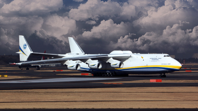Large jetliner runway cloudy sky #2 free wallpaper - medium preview image