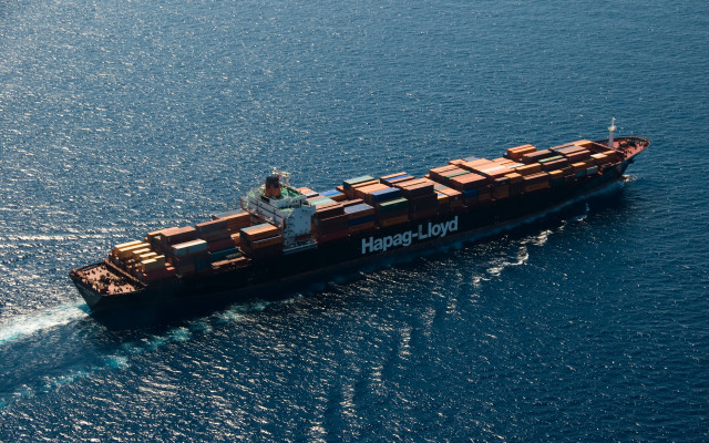Cargo ship ocean containers man free wallpaper - medium preview image