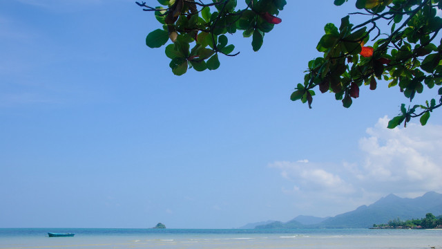 Boat beach mountains sky clouds free wallpaper - medium preview image