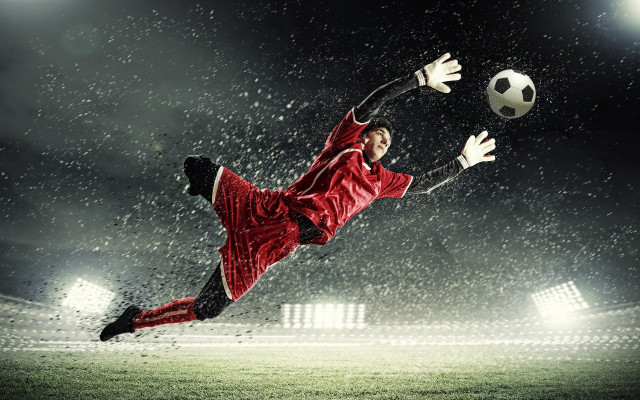 Soccer player red uniform kicking #2 free wallpaper - medium preview image