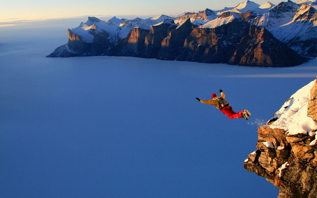Man jumping cliff snowboard mountain #2 free wallpaper - medium preview image