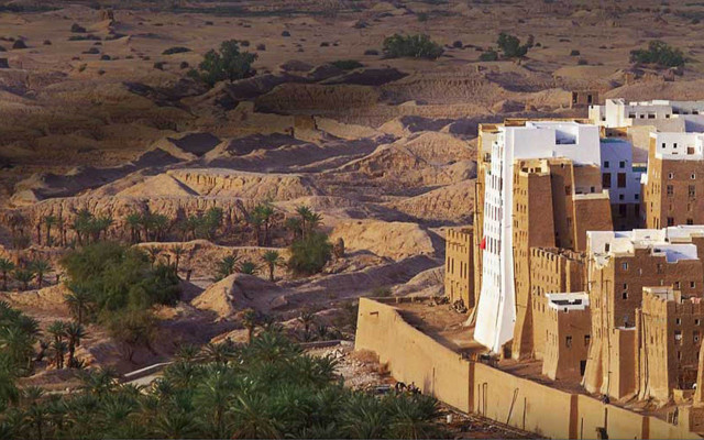 Desert city sand dunes trees free wallpaper - medium preview image