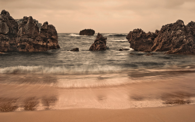 Beach rock formation waves person free wallpaper - medium preview image