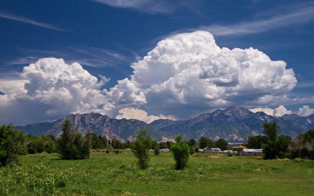 Mountain field trees clouds sky free wallpaper - medium preview image