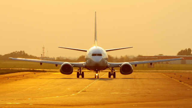 Large jetliner sunset runway beautifully free wallpaper - medium preview image