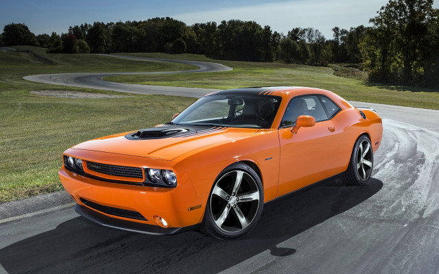 Bright orange car green field free wallpaper - medium preview image