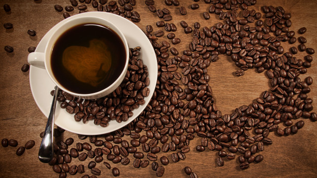 Coffee heart cookie on beans free wallpaper - medium preview image