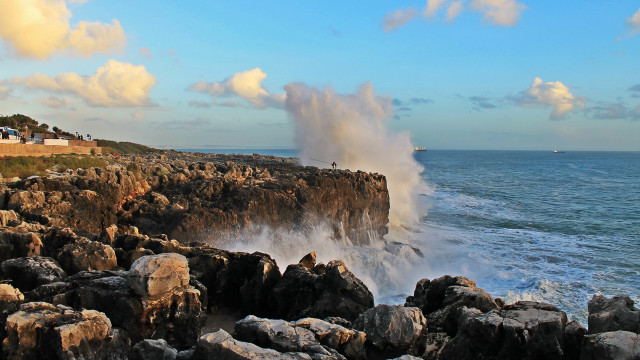 Wave crash rocks boat sailing free wallpaper - medium preview image