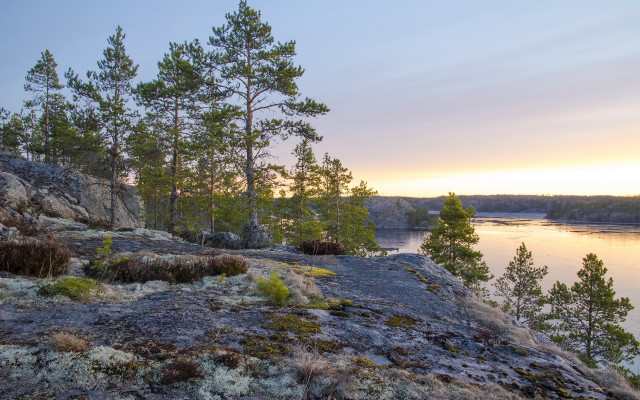 Rocky cliff lake sunset trees free wallpaper - medium preview image