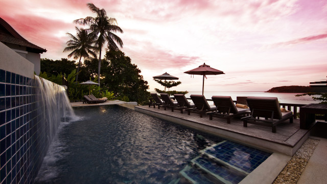 Pool waterfall chairs ocean sunset free wallpaper - medium preview image
