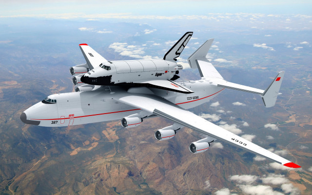 Jetliner flying mountain range red free wallpaper - medium preview image