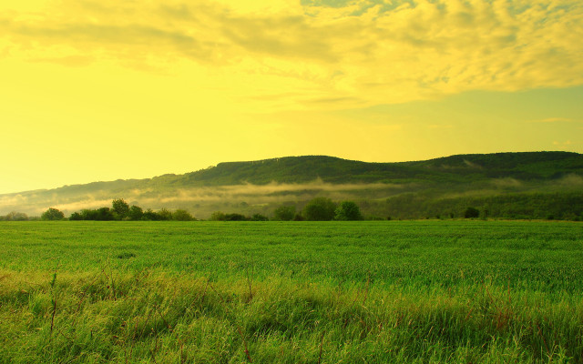 Mountain field yellow sky clouds free wallpaper for desktop - medium preview image