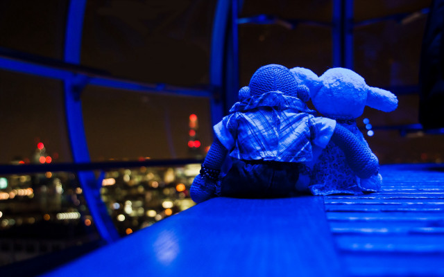 Teddy bear ledge night city free wallpaper - medium preview image